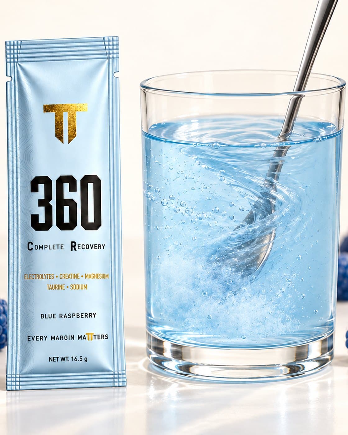 Stirring 360 Complete Recovery into a glass of cold water